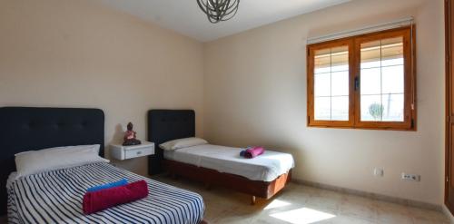 Habitación con camas individuales